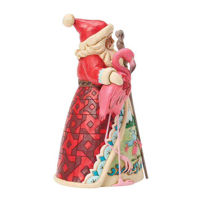 Santa with Flamingo Figurine
